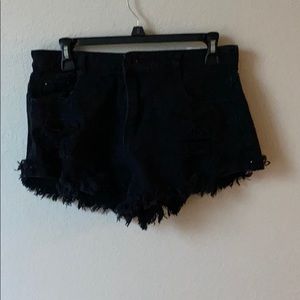 Distressed black denim shorts
